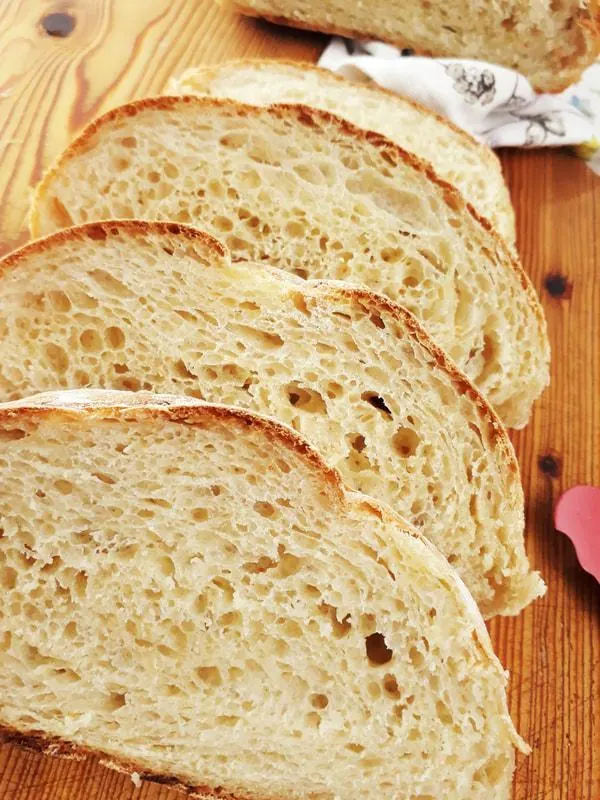 Bread slices showing a soft, airy crumb